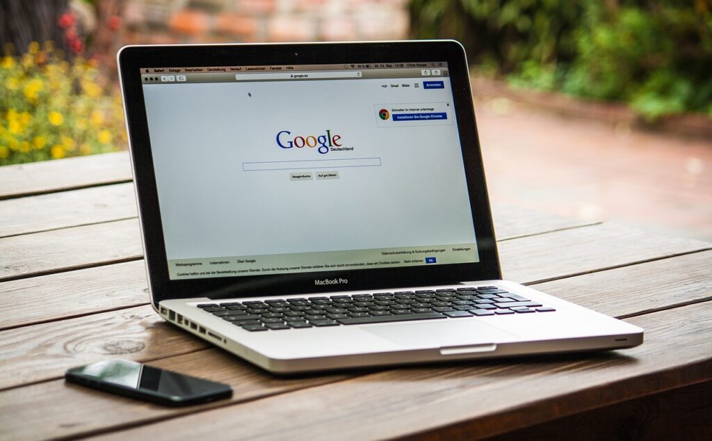 image showing a laptop with chrome browser used for writing