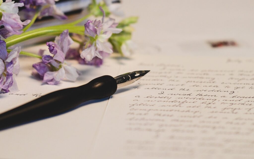 image showing a diary page decorated with calligraphy hand writing and flowers