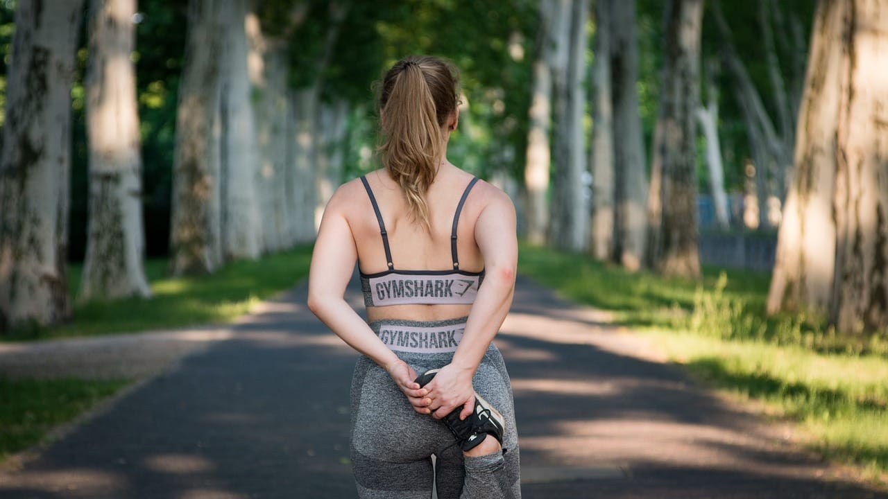 image showing a women working out on her self improvement routine - example of fitness routine
