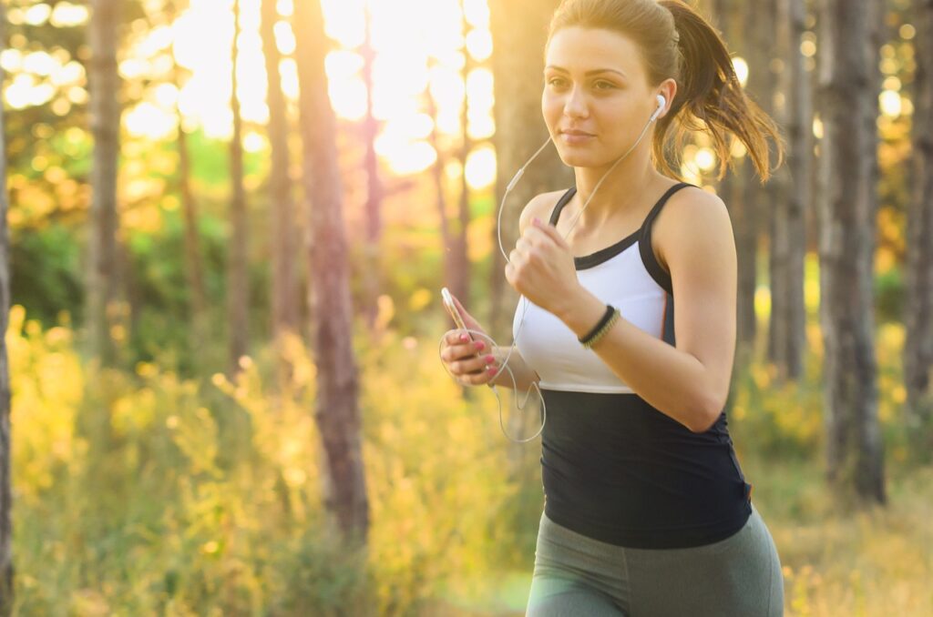 image showing a woman jogging regularly for her self improvement