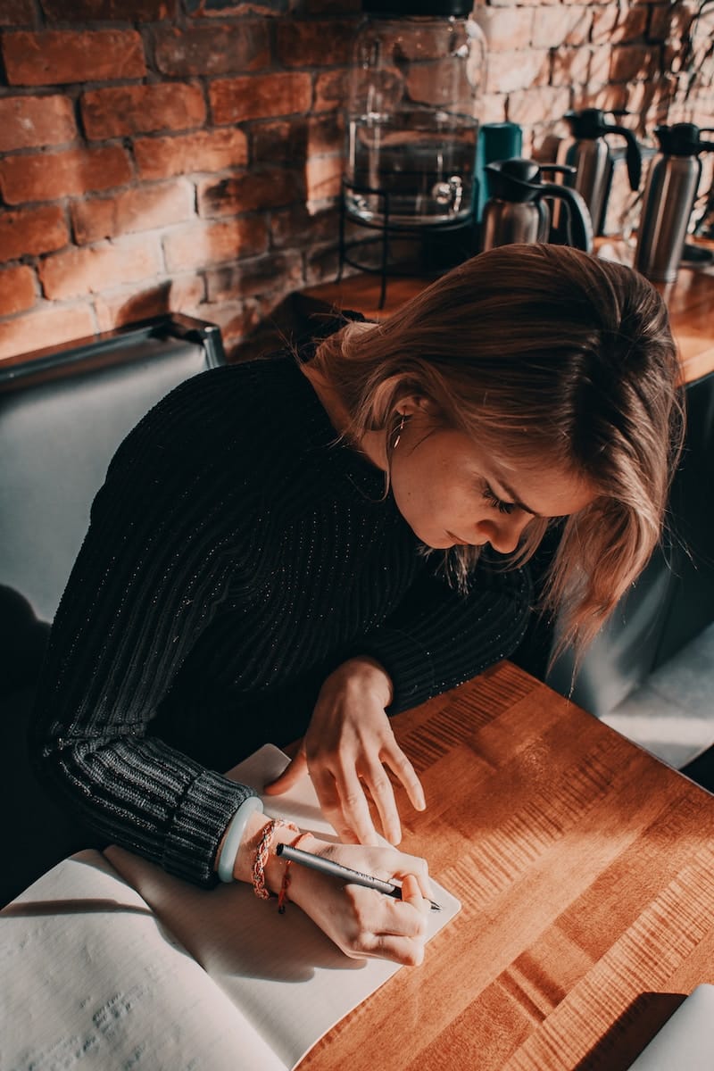 woman writing a diary