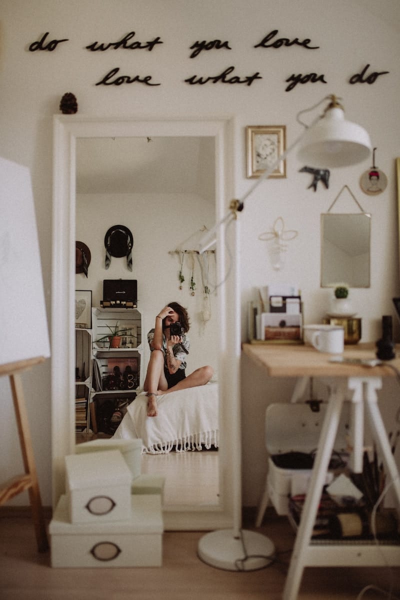person sitting a room with outstanding interior design