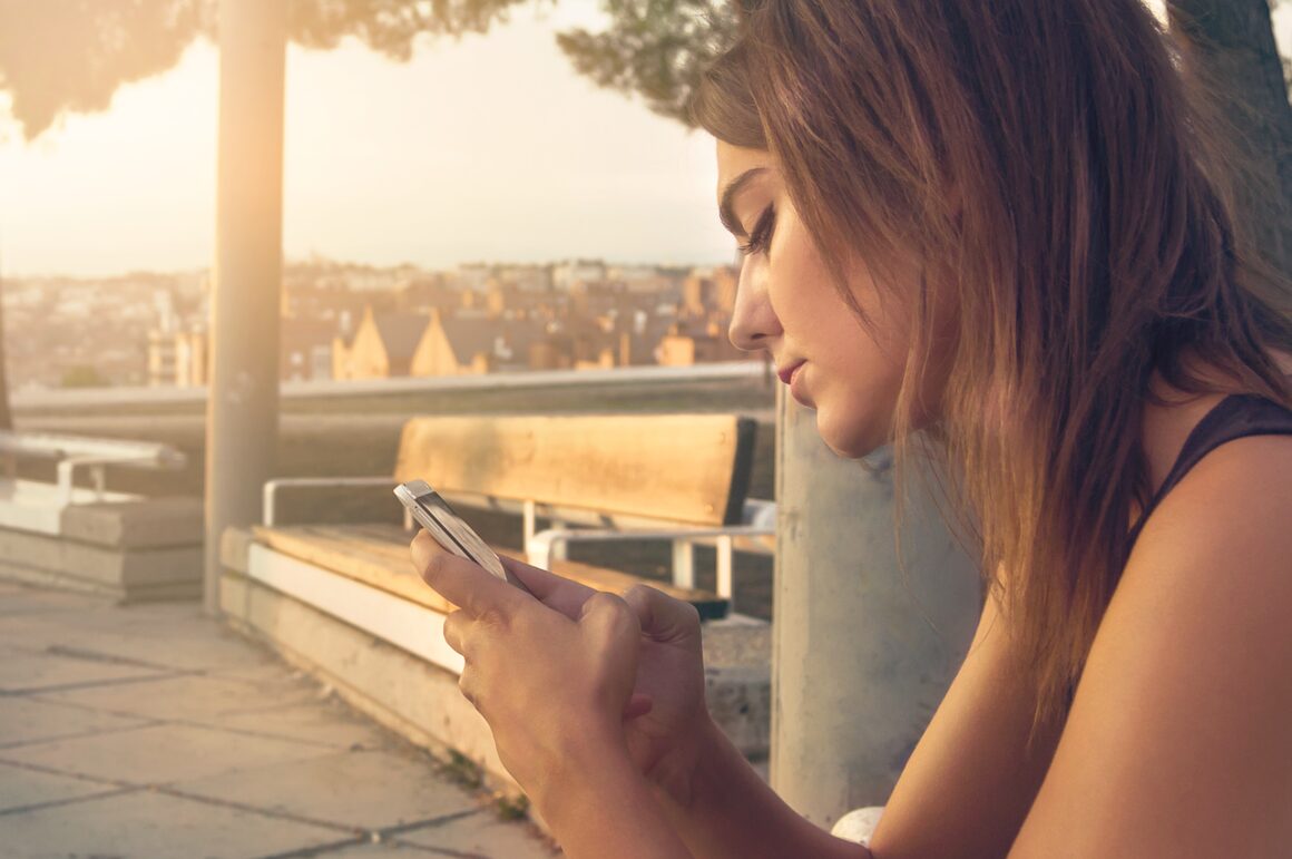 image showing a person happy with silent phone